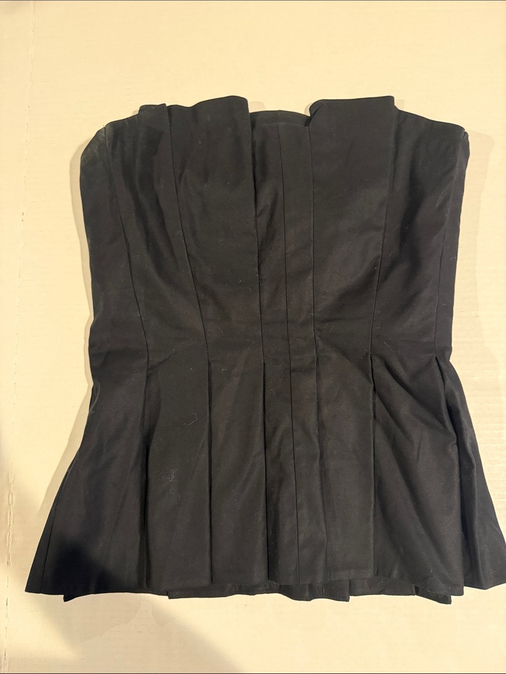 Black Strapless Pleated Peplum Top